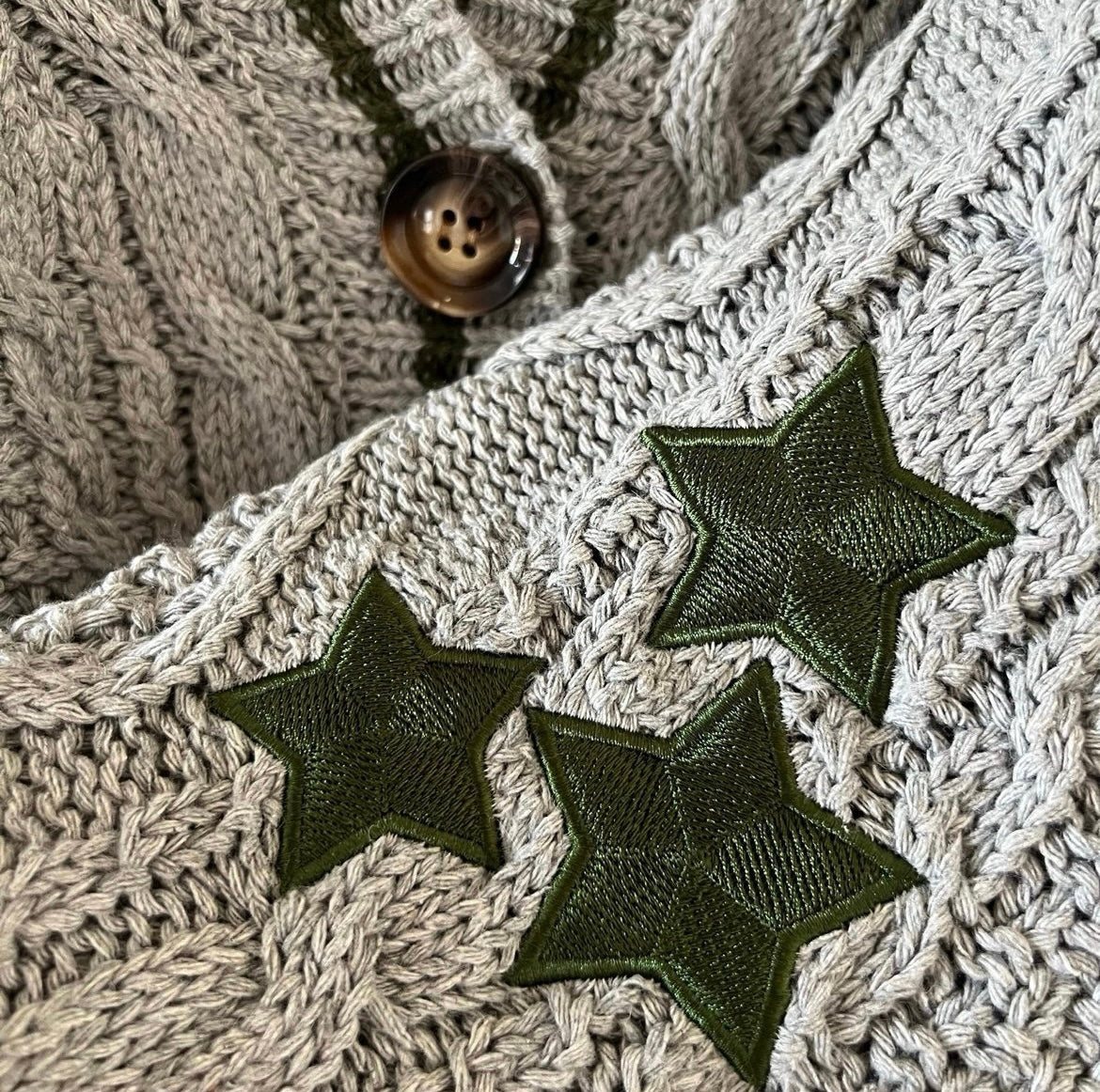 Swiftie gray cardigan green stars holiday vibe