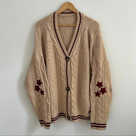 Swiftie beige cardigan red stars holiday vibe